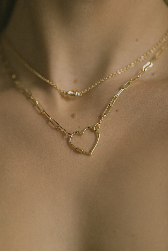 gold chain with heart motif